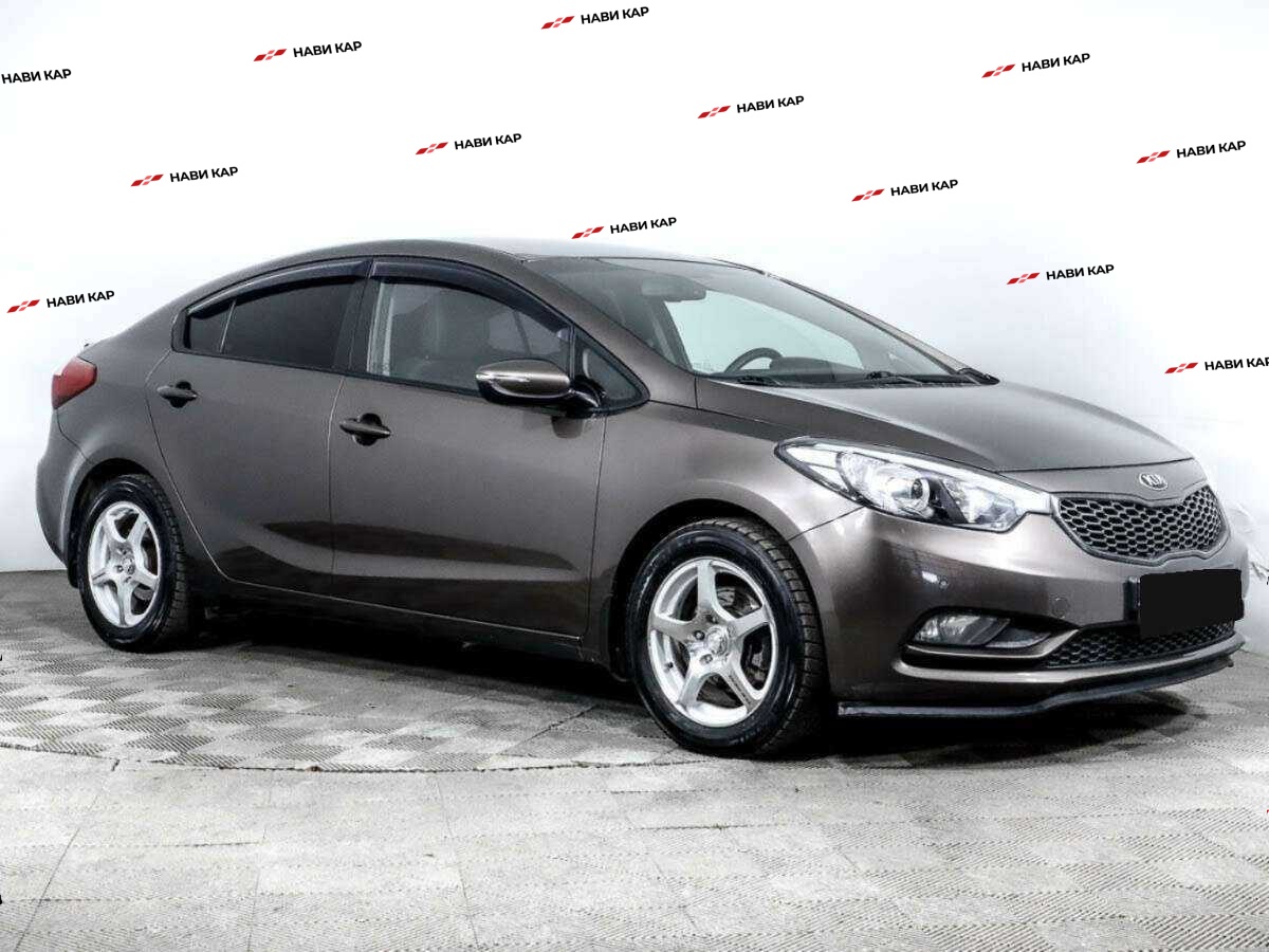 Kia Cerato с пробегом — 2015 год. Фото: #2
