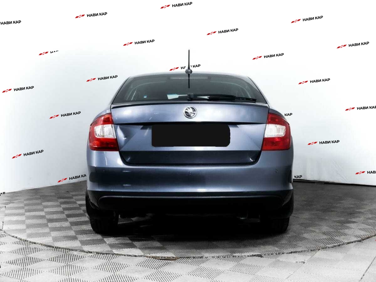 Skoda Rapid с пробегом — 2014 год. Фото: #4
