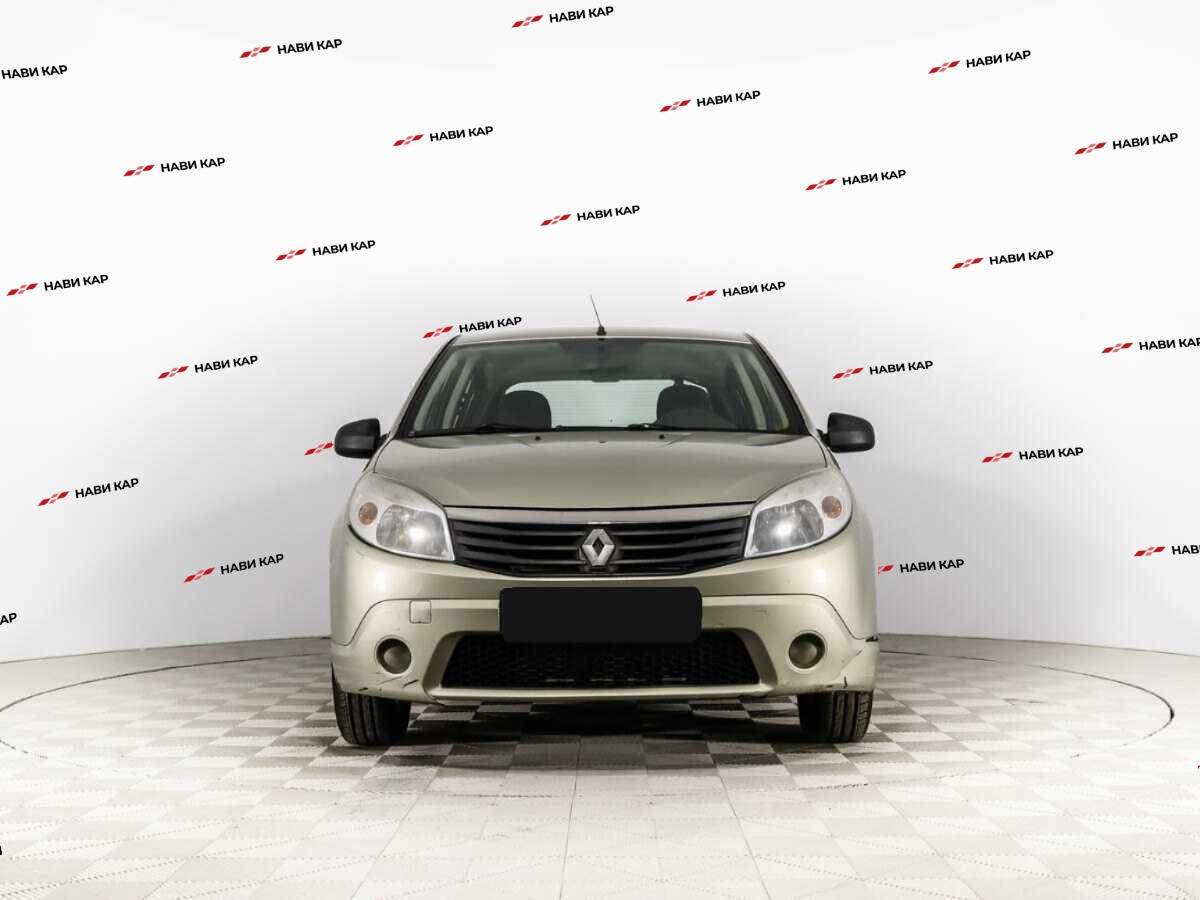 Renault Sandero с пробегом — 2013 год. Фото: #1