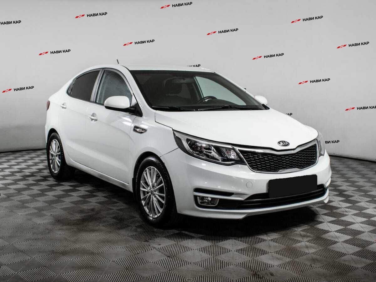 Kia Rio с пробегом — 2015 год. Фото: #2