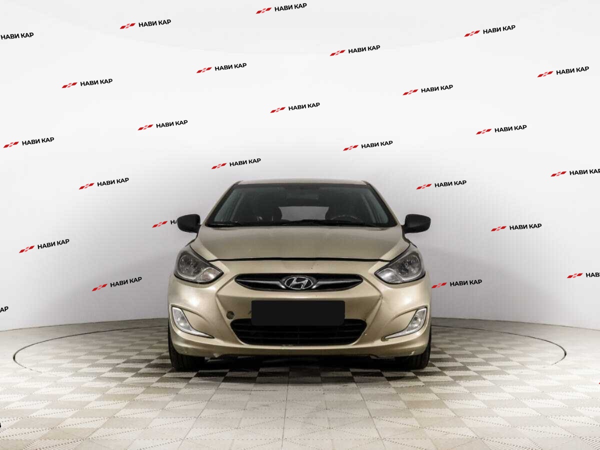 Hyundai Solaris с пробегом — 2013 год. Фото: #1