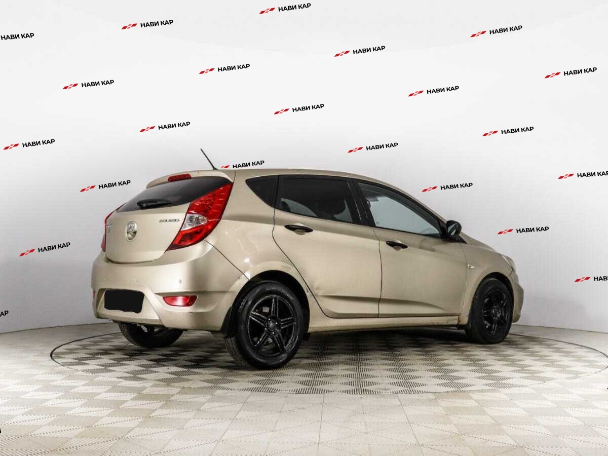 Hyundai Solaris с пробегом — 2013 год. Фото: #4