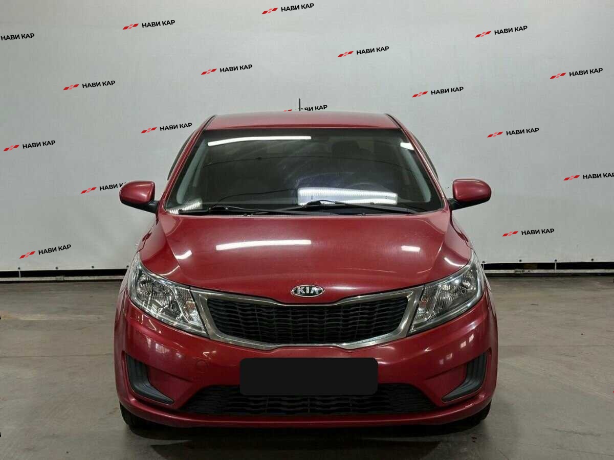 Kia Rio с пробегом — 2013 год. Фото: #1