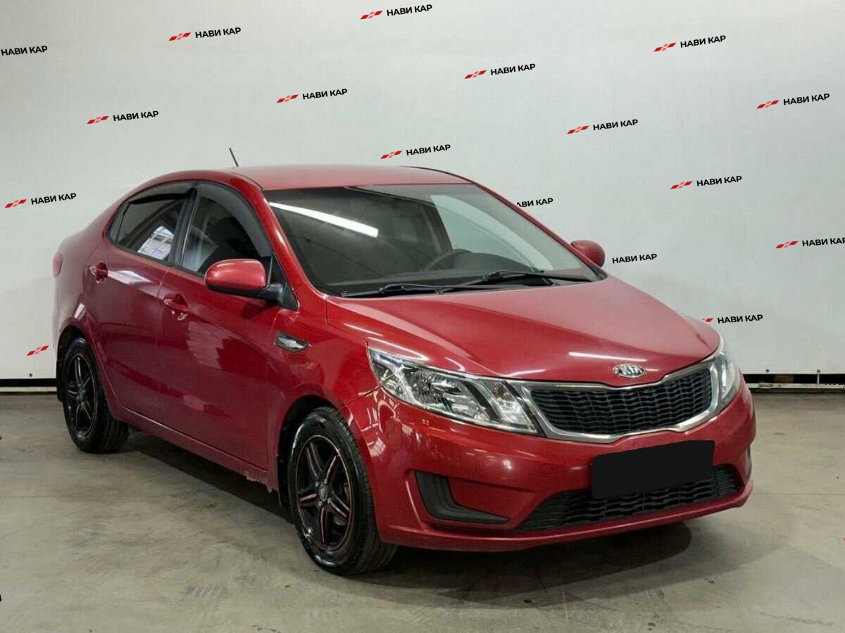 Kia Rio с пробегом — 2013 год. Фото: #2
