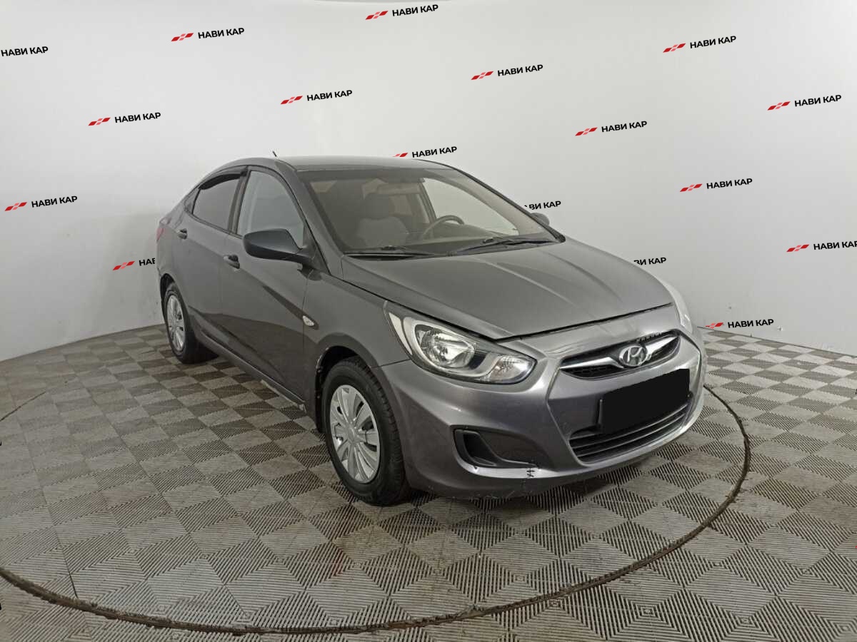 Hyundai Solaris с пробегом — 2013 год. Фото: #2