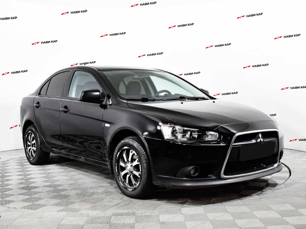 Mitsubishi Lancer с пробегом — 2012 год. Фото: #2