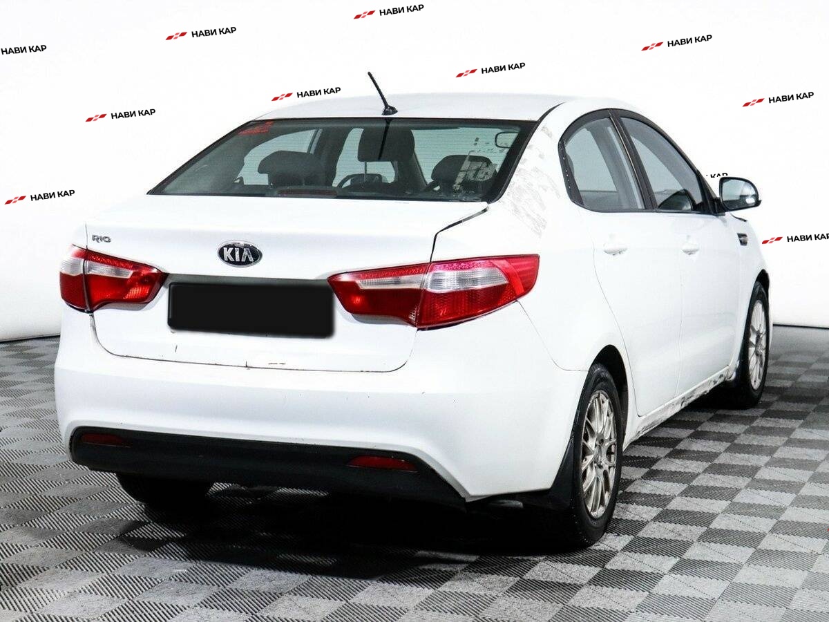 Kia Rio с пробегом — 2013 год. Фото: #3