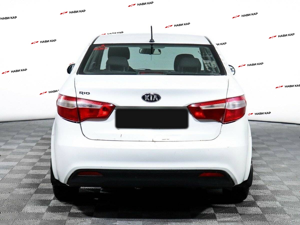 Kia Rio с пробегом — 2013 год. Фото: #4
