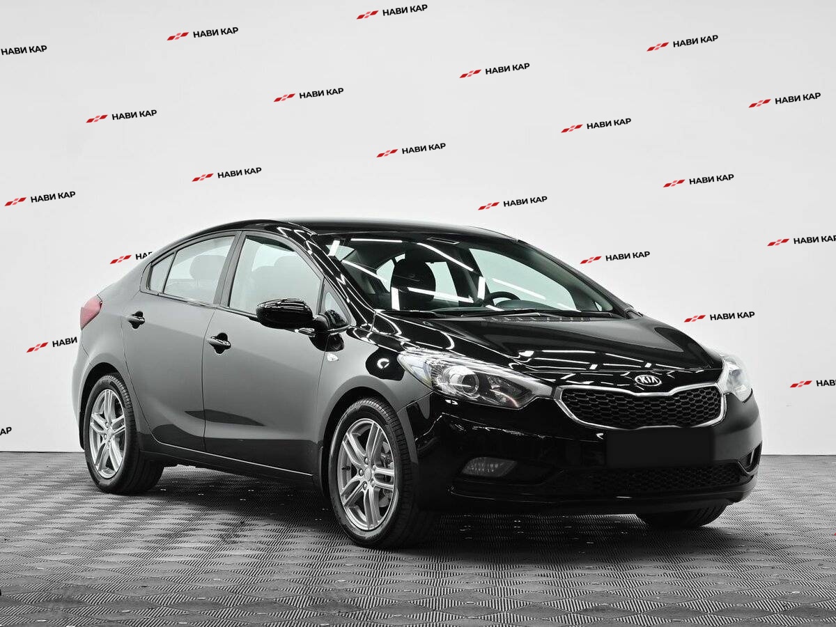 Kia Cerato с пробегом — 2015 год. Фото: #1