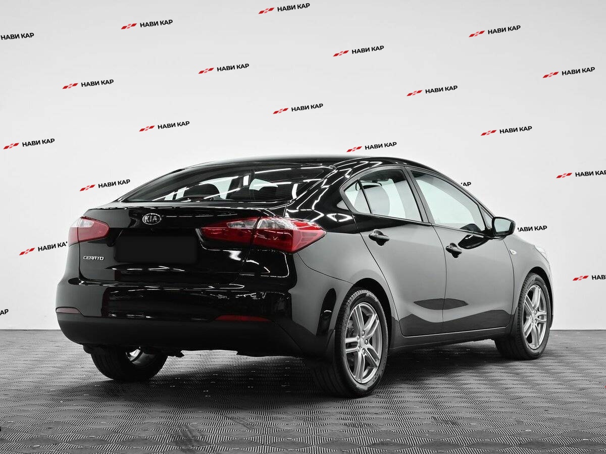 Kia Cerato с пробегом — 2015 год. Фото: #3