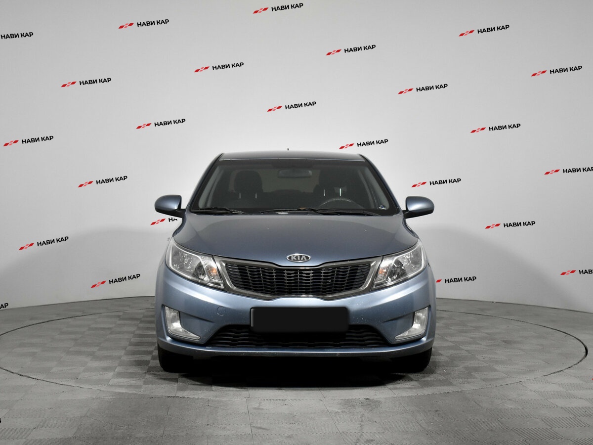 Kia Rio с пробегом — 2012 год. Фото: #1