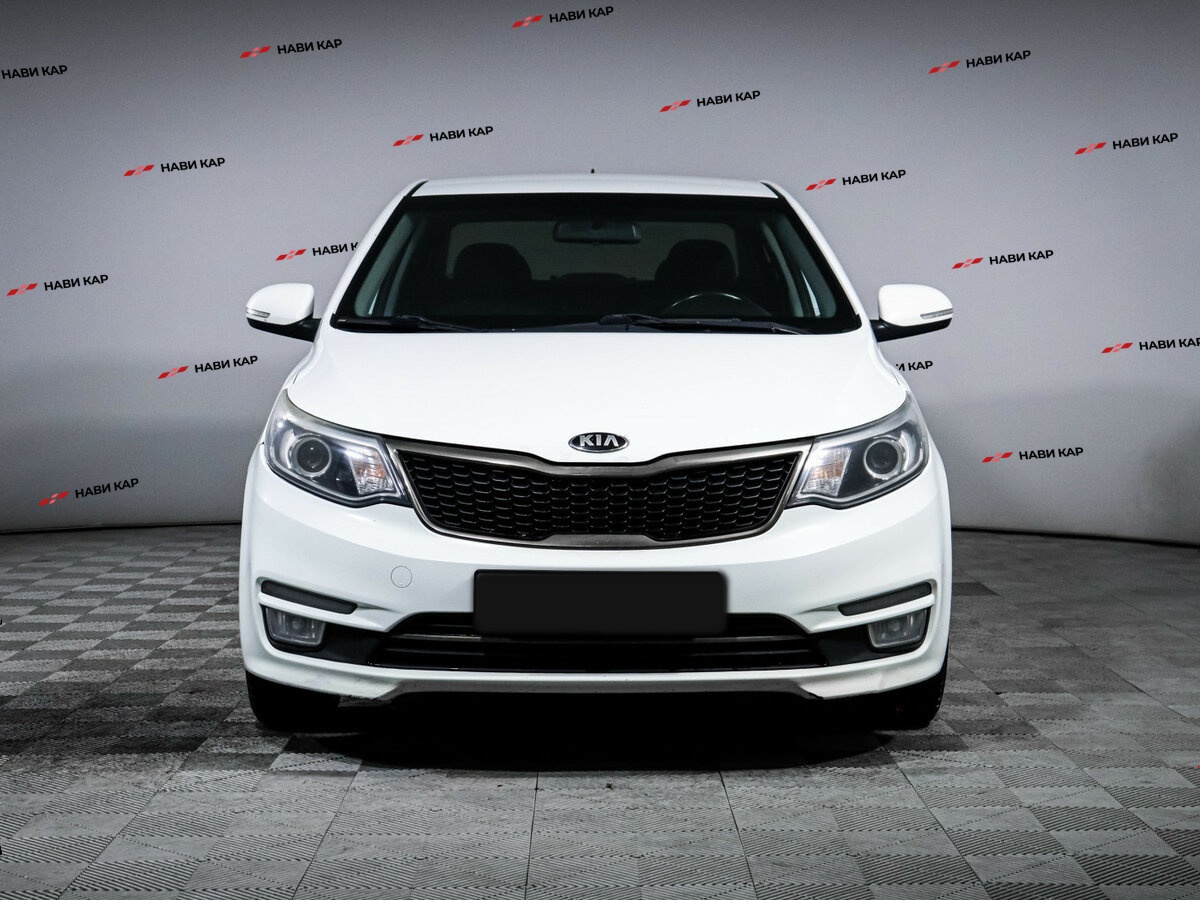 Kia Rio с пробегом — 2015 год. Фото: #1