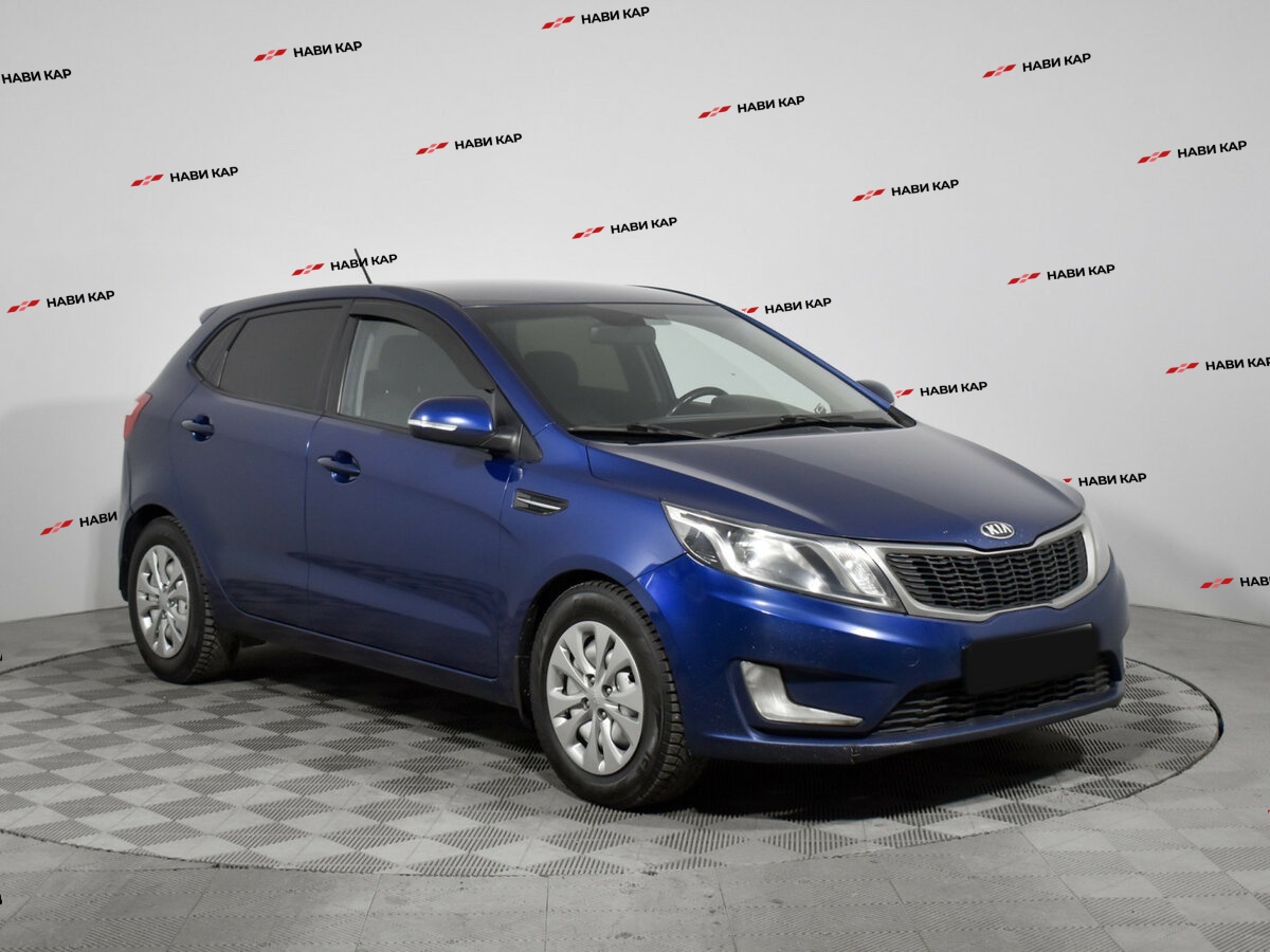 Kia Rio с пробегом — 2014 год. Фото: #2