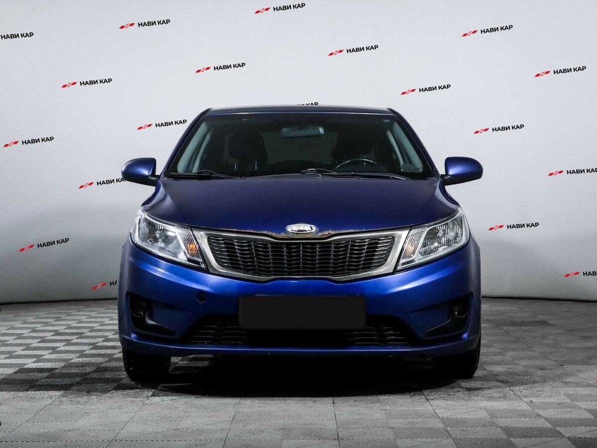Kia Rio с пробегом — 2015 год. Фото: #1