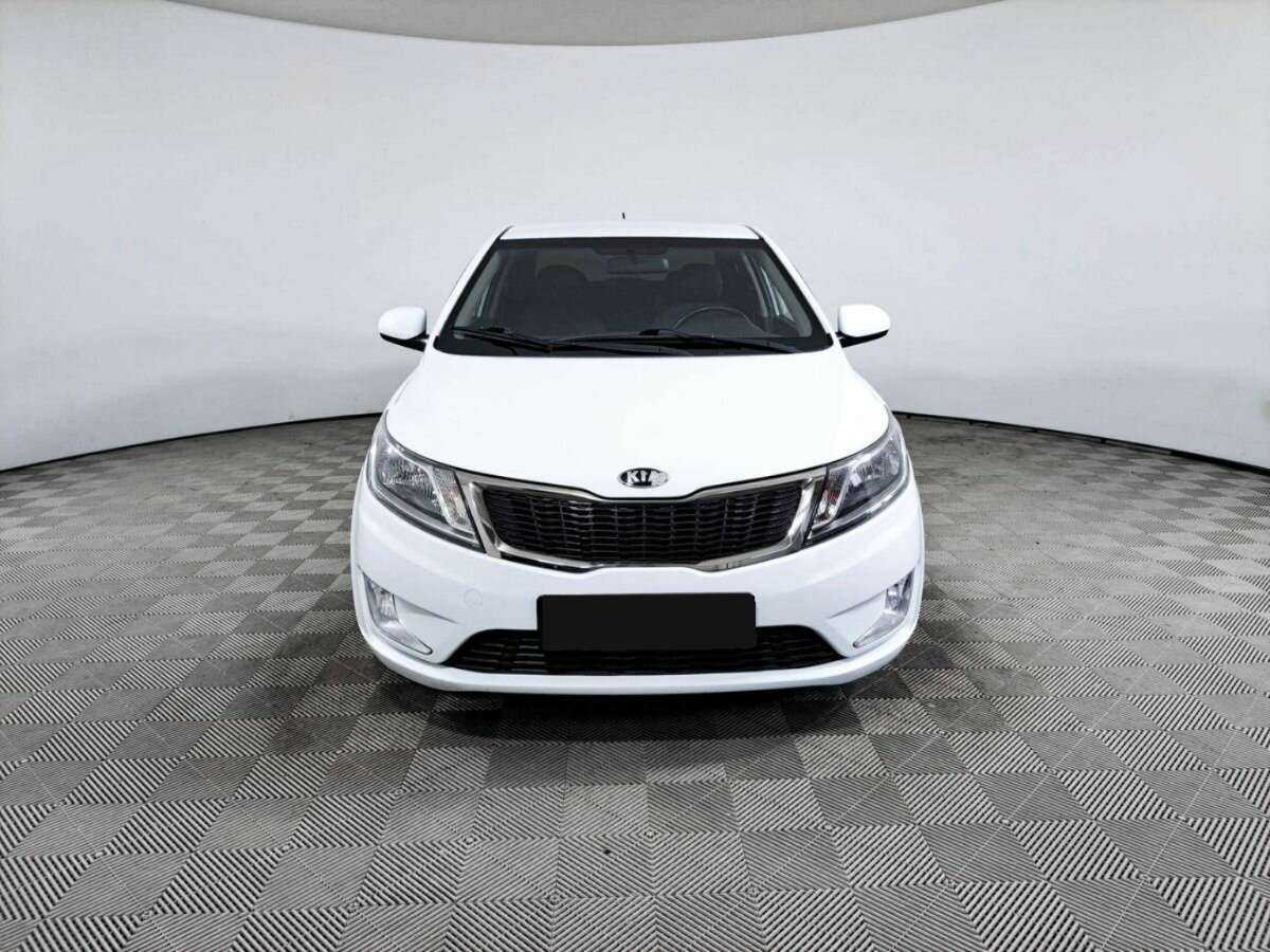 Kia Rio с пробегом — 2014 год. Фото: #1