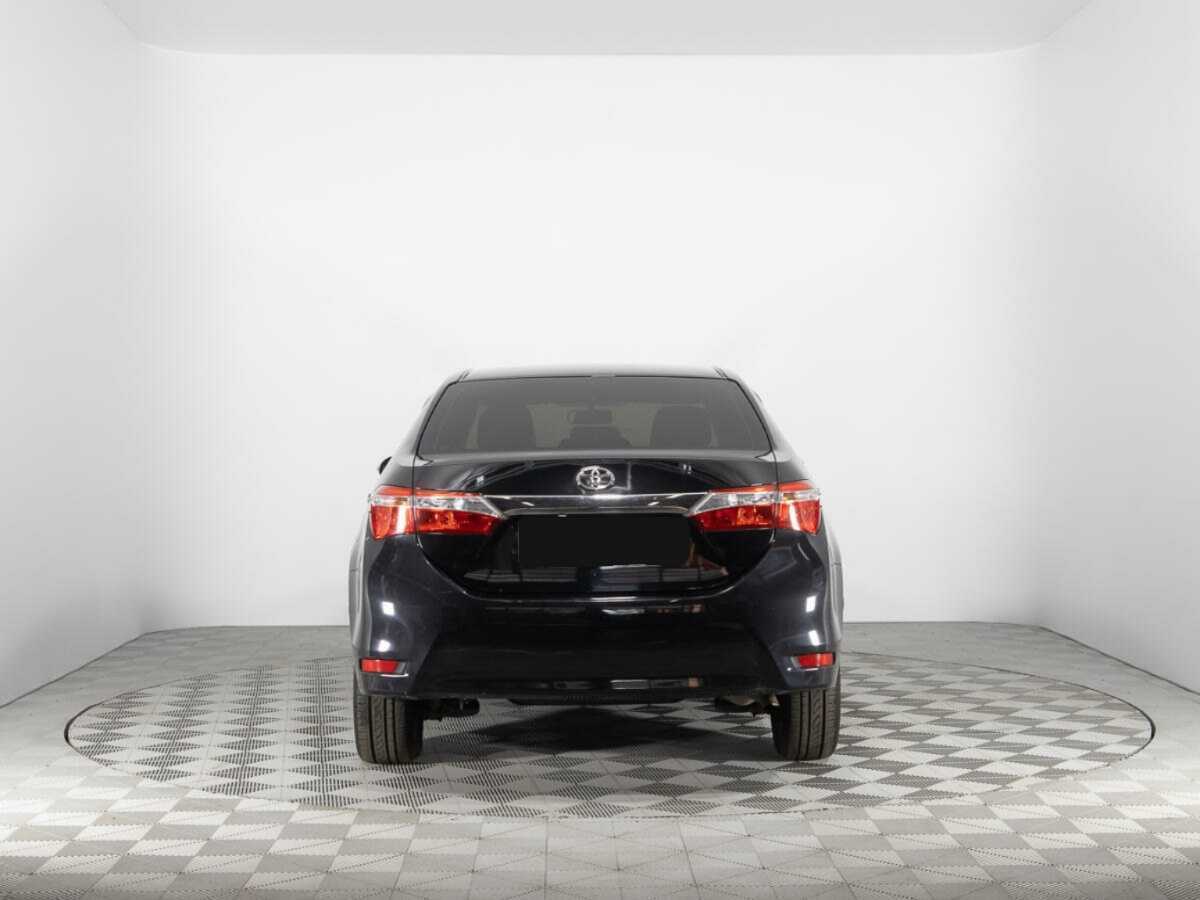 Toyota Corolla с пробегом — 2014 год. Фото: #5