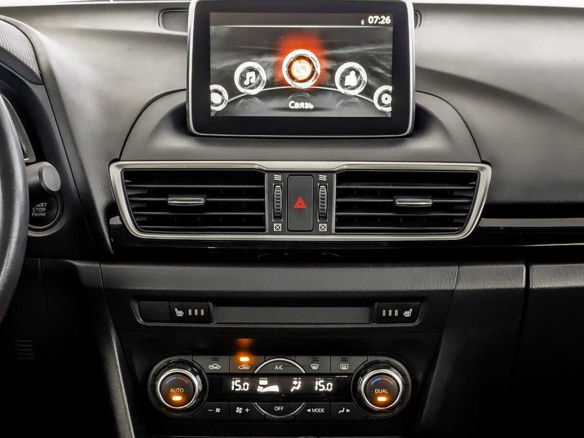Mazda 3 с пробегом — 2015 год. Фото: #12