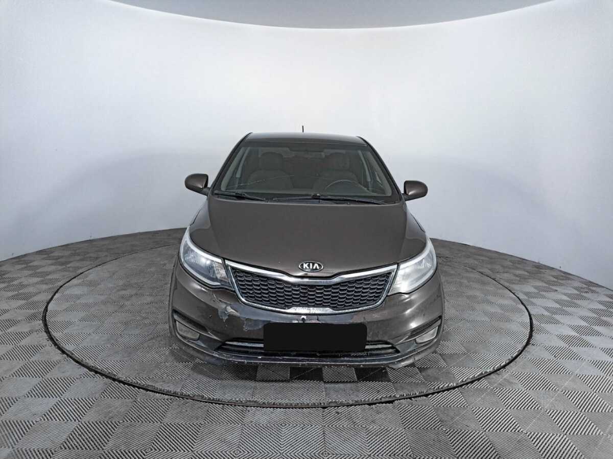 Kia Rio с пробегом — 2015 год. Фото: #1