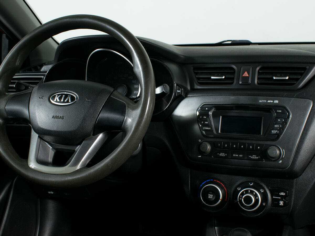 Kia Rio с пробегом — 2012 год. Фото: #11