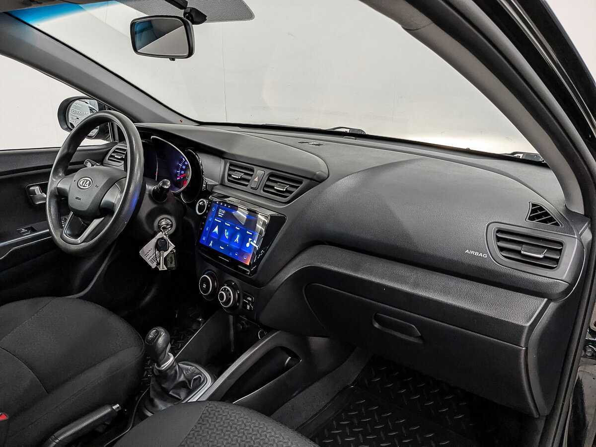 Kia Rio с пробегом — 2012 год. Фото: #12